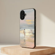 Jesus Walking on Water MagSafe® clear iPhone case with peaceful Christian artwork of Jesus walking along reflective water at sunset, displayed on a wooden platform in a minimalist studio setting