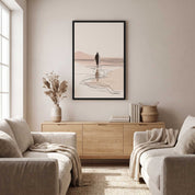 Minimalist line art print of Jesus walking on water in a black frame hanging on a beige wall above a light wood console table in a modern living room.