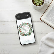Joy to the World Christmas MagSafe iPhone case with watercolor evergreen wreath and holly berries.