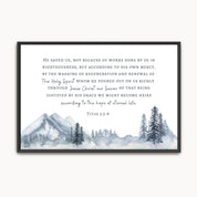 Framed artwork with mountain and tree landscape and Bible verse text.