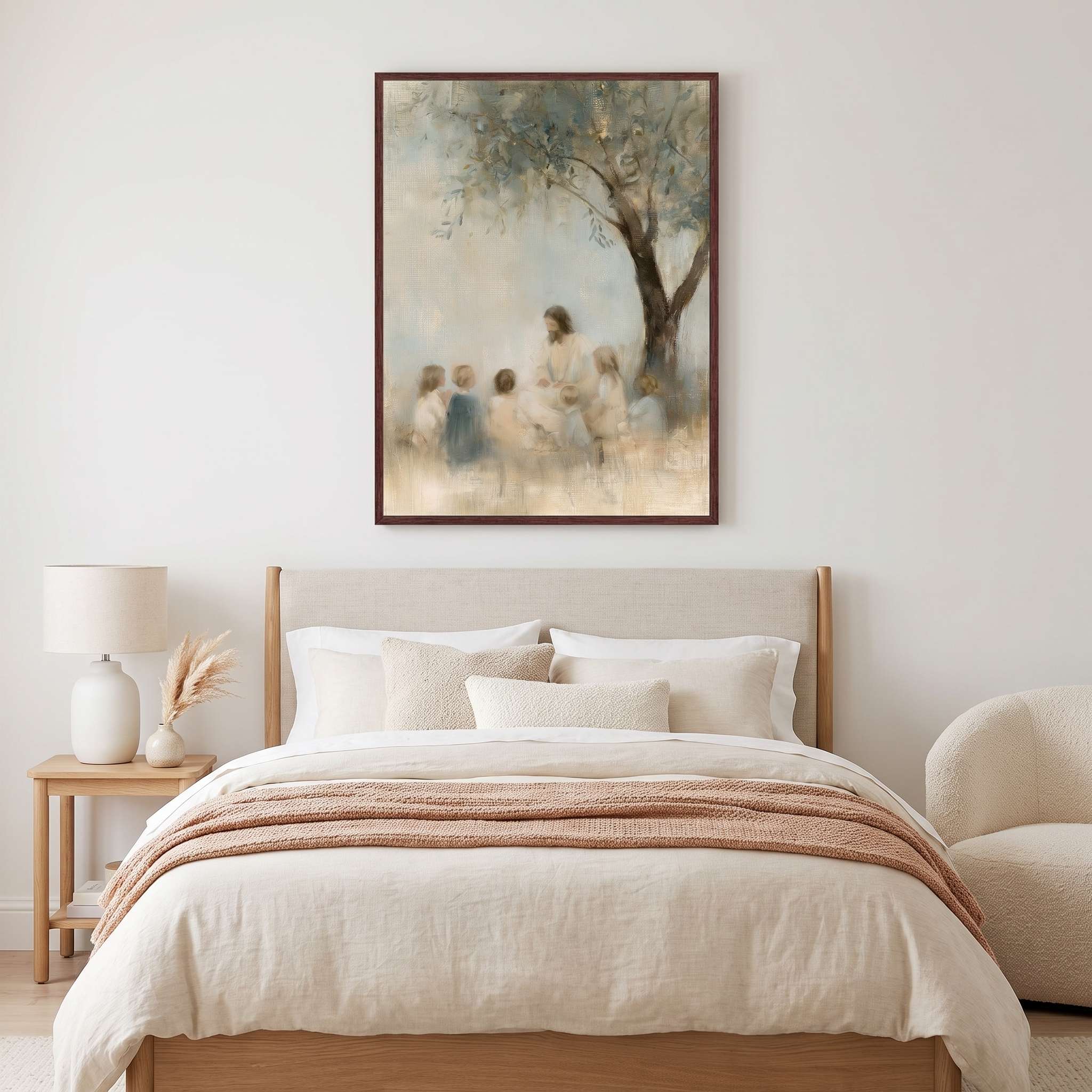 Let the Little Children Come Jesus with children Christian framed print above a bed with cream bedding and a textured blush throw in a neutral bedroom.
