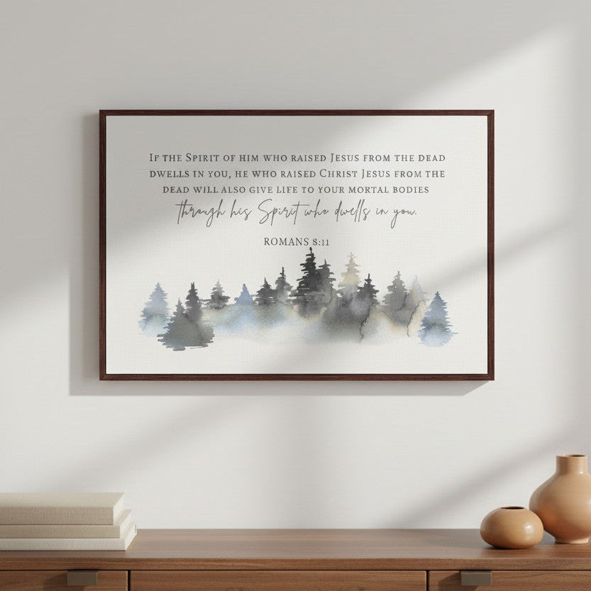 Framed Christian wall art featuring Romans 8:11 with a watercolor forest design