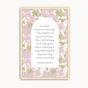 Christian Scripture wall art featuring 1 Corinthians 13:4–8, "Love is patient, love is kind," surrounded by soft watercolor pink, lavender, and cream florals. Elegant Bible verse artwork for weddings, bedrooms, living rooms, or Christian homes.