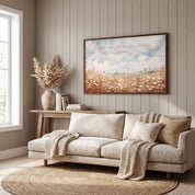 Matthew 6:28 Scripture wall art featuring a peaceful wildflower meadow, styled above a cream sofa in a cozy neutral living room.