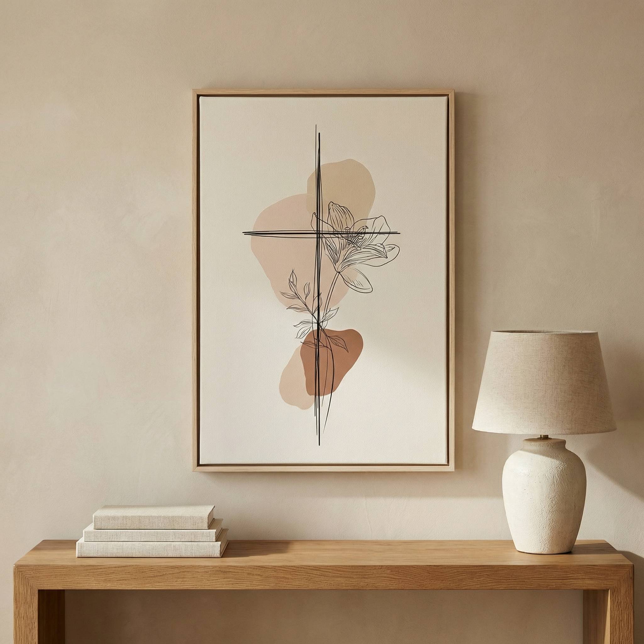 Minimalist cross and lily line art Christian wall art above wooden console table in neutral beige room