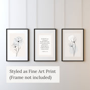 Minimalist Floral Wall Art triptych set featuring two tulip line art prints and a central scripture quote framed on a white vertical shiplap wall.