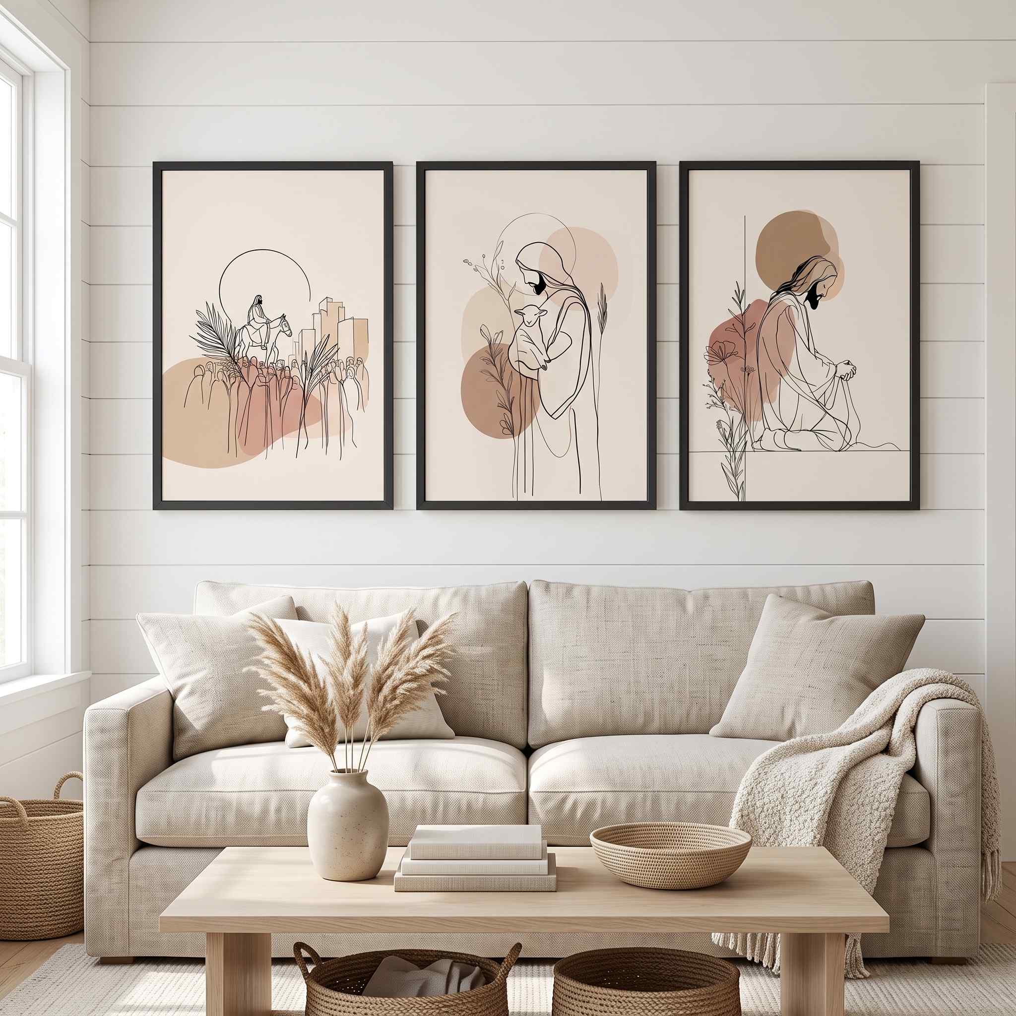 Minimalist Jesus 3-piece framed canvas wall art triptych set displayed on a white paneled wall above a beige sofa in an organic modern living room.
