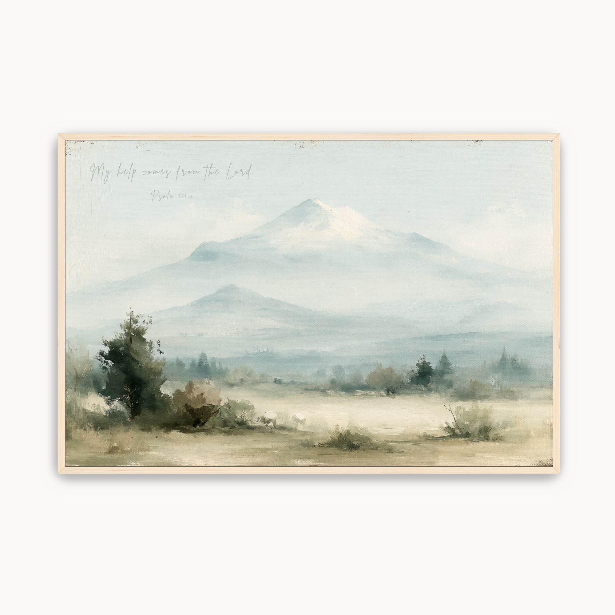Vintage Psalm 121:2 Christian wall art featuring a snow-capped mountain landscape canvas print with handwritten script scripture, misty fields, and a maple wood frame.