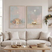 Framed Nativity Christmas wall art diptych above a beige sofa, showing the Holy Family and Star of Bethlehem in a bright living room.
