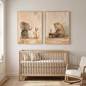 Two framed neutral watercolor Christian nursery art prints displayed above a light wood crib, featuring an elephant and rabbit on the left and a praying bear on the right.