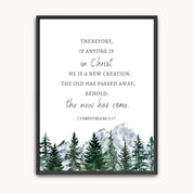Framed watercolor mountain and forest Christian wall art featuring the Bible verse 2 Corinthians 5:17, "If anyone is in Christ, he is a new creation.