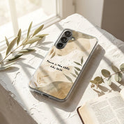 Christian Samsung Phone case with nature design and text on a light surface with leaves and an open book.
