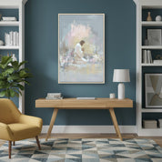 Soft watercolor artwork of Jesus kneeling in prayer hung above a bright living room couch.