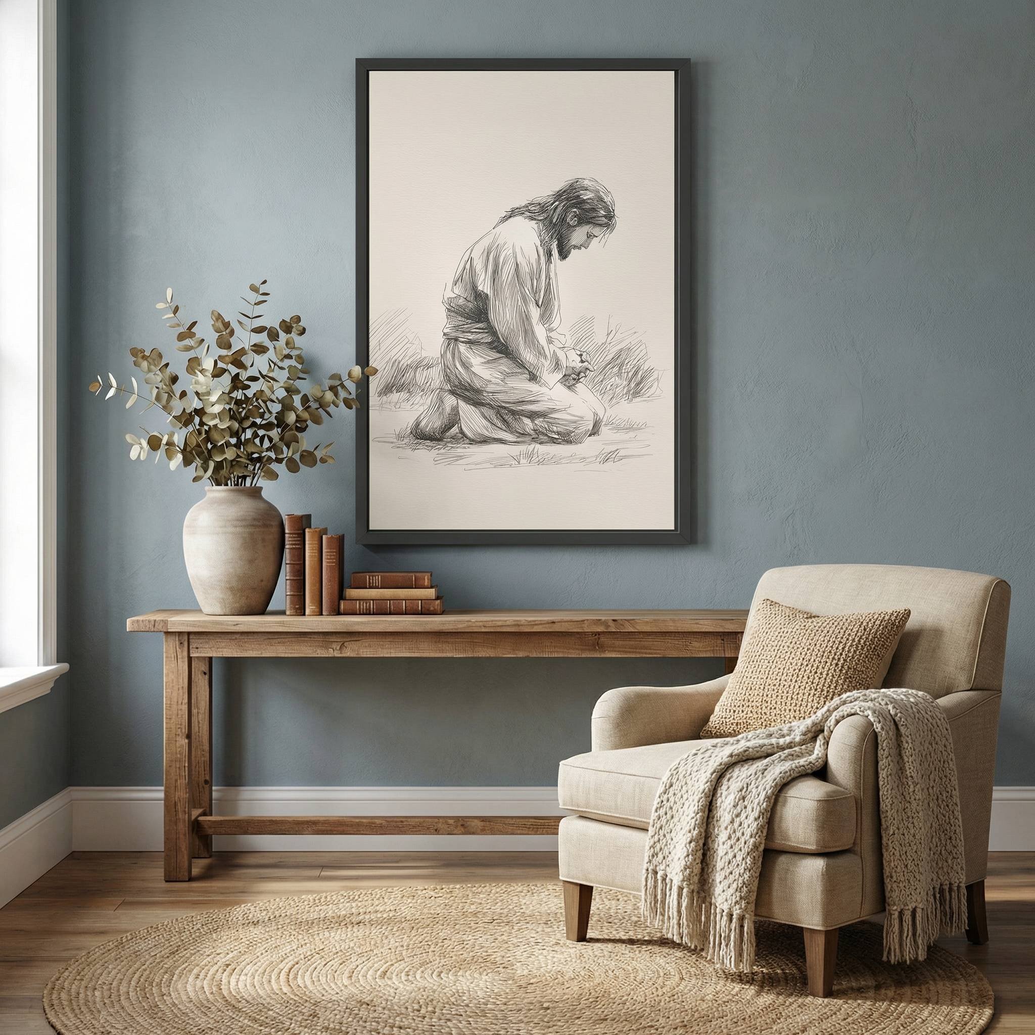 Minimalist praying Jesus sketch wall art displayed in modern living room