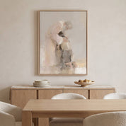 Framed watercolor Prodigal Son Christian wall art of a father embracing his returning son, displayed above a light wood dining sideboard with plates and pears.