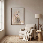 Framed Christian wall art of a father embracing the returning son from the Prodigal Son parable, displayed beside a cozy reading chair and floor lamp.