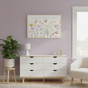 Framed Proverbs 3:5 wildflower wall art above a white dresser against a soft purple wall, styled with a potted plant and a lamp.