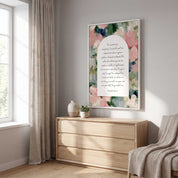 Framed vintage Christian floral wall art titled Psalm 23:1–4 featuring "The Lord is my shepherd" with watercolor botanical artwork, displayed in a white frame on a light wall above a wooden dresser in a bright Scandinavian bedroom.