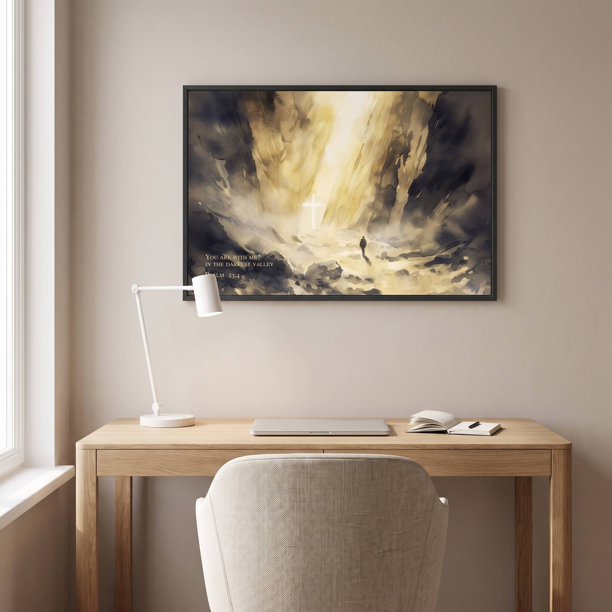 Psalm 23:4 Darkest Valley Christian wall art featuring a glowing cross, framed above a light wood desk in a calm Scandinavian home office.