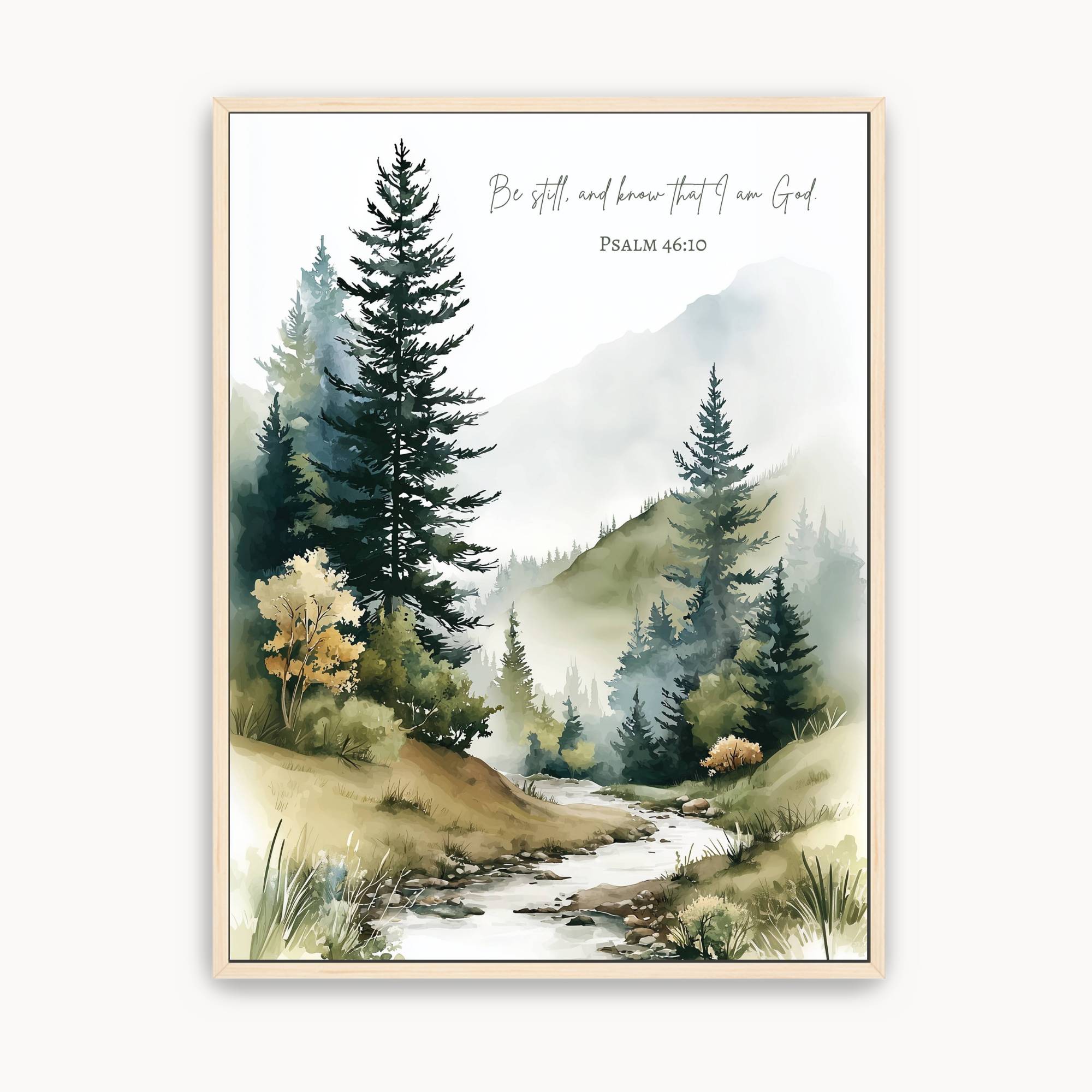 Watercolor mountain landscape Christian wall art featuring Psalm 46:10, "Be still and know that I am God," with evergreen trees, misty mountains, and a peaceful flowing stream. Scripture canvas for living room, bedroom, office, or prayer room.