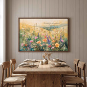 Psalm 96:12 Christian wildflower meadow wall art above a rustic dining table, with a colorful watercolor landscape and Bible verse.