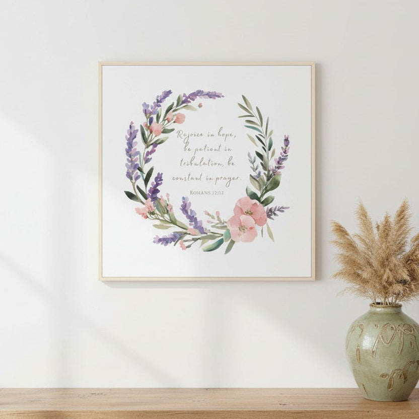 Christian watercolor wall art with lavender wreath and Romans 12:12 verse — “Rejoice in hope, be patient in tribulation, be constant in prayer.”