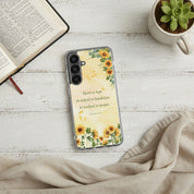 Rejoice in Hope Romans 12:12 Christian Samsung Galaxy phone case with sunflower design on a white wood surface next to an open Bible and a small succulent.