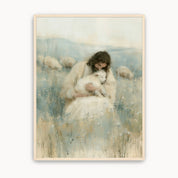 Rest in His Arms Christian wall art showing Jesus gently holding a white lamb in a meadow with sheep behind Him, displayed in a light wood frame.