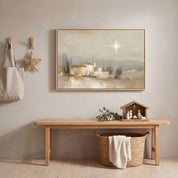Framed vintage Christmas Christian wall art titled The Star Over Bethlehem, depicting the glowing star above Bethlehem, displayed in an entryway above a wooden bench with a nativity scene.