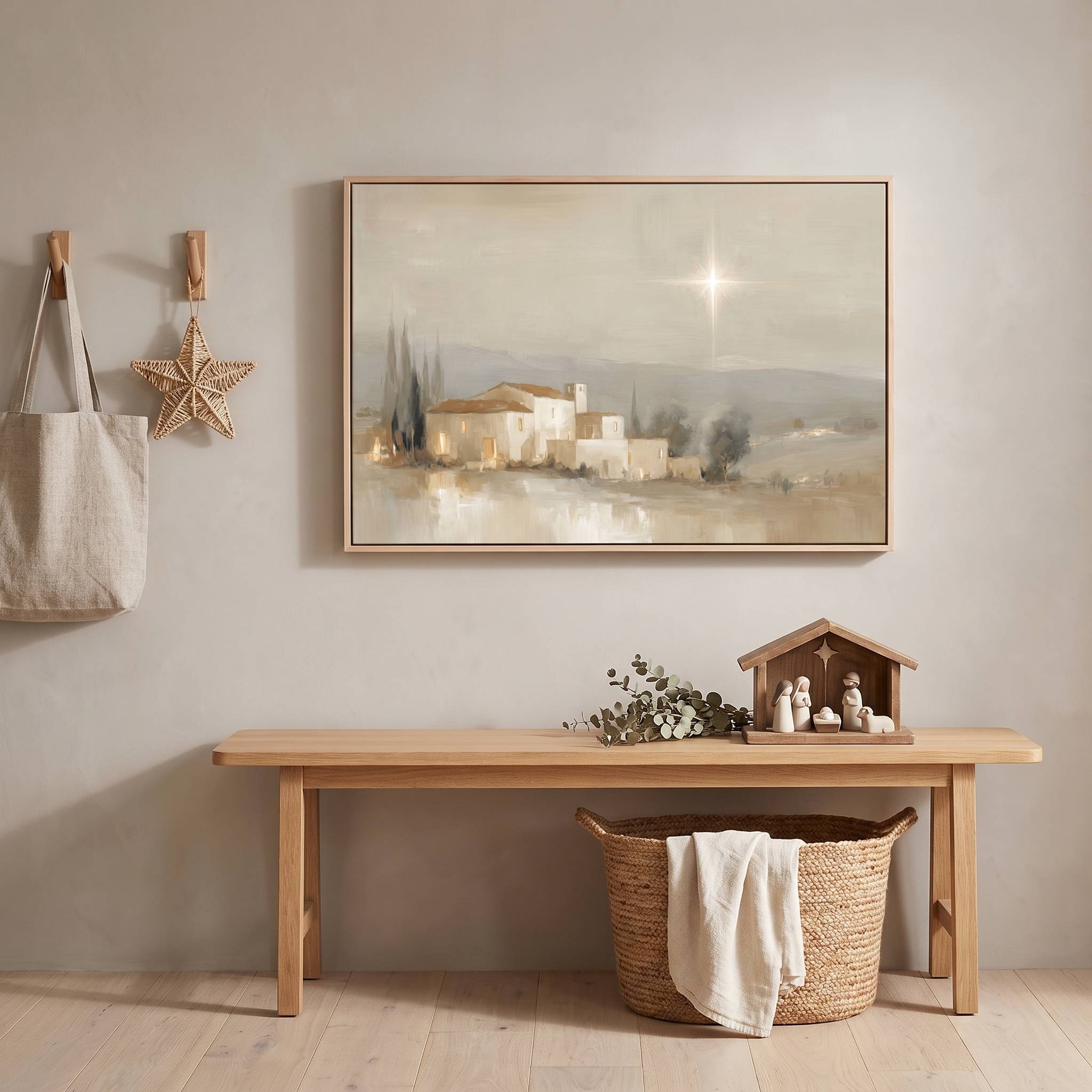 Framed vintage Christmas Christian wall art titled The Star Over Bethlehem, depicting the glowing star above Bethlehem, displayed in an entryway above a wooden bench with a nativity scene.