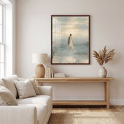 Framed Take Courage Jesus walking on water Christian wall art above a wooden console with books and a lamp beside a cream sofa in a sunlit living room.