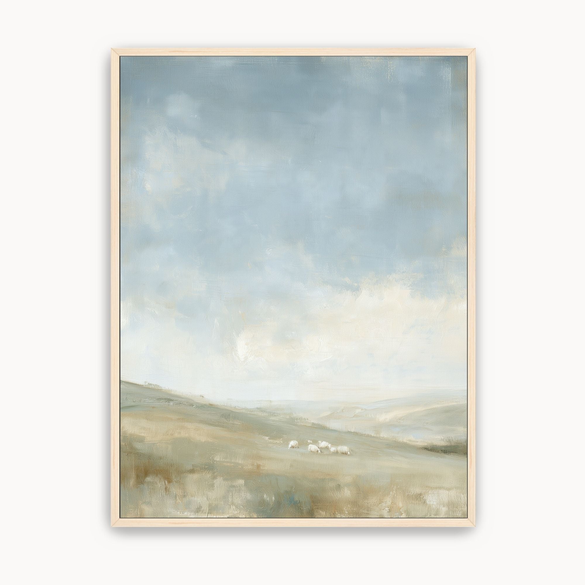 The Earth Is the Lord’s Christian landscape wall art with rolling green hills, grazing sheep and an expansive blue sky, in a light wood frame.