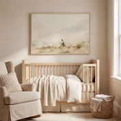 Framed vintage fine art canvas painting of Jesus leading sheep hanging on a beige wall above a wooden crib and plush armchair in a soft neutral nursery.