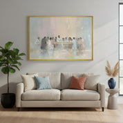 Watercolor Christian wall art of The Last Supper with pastel hues, displayed in a cozy living room with blue walls and greenery.