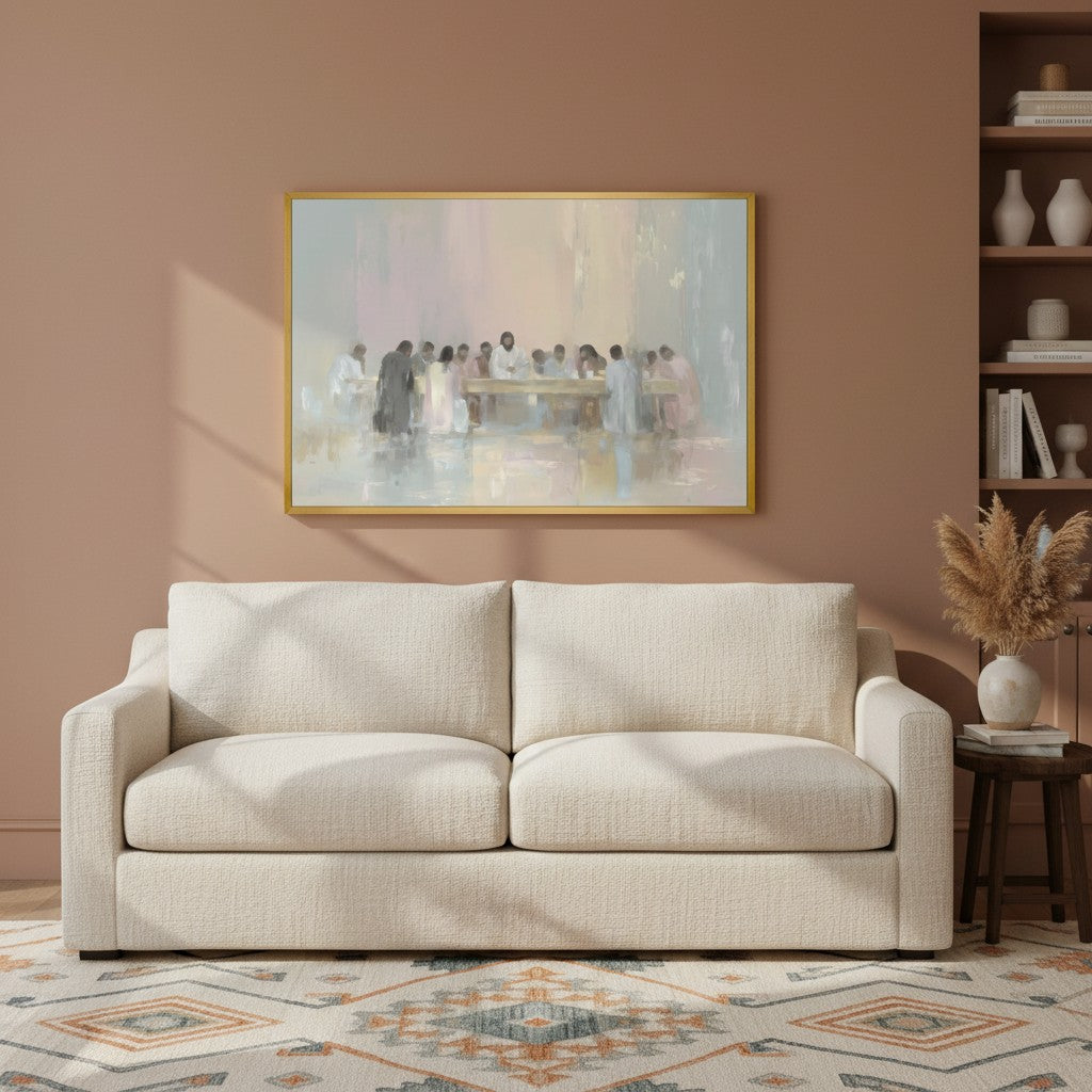 Framed watercolor Last Supper wall art portraying Jesus and disciples, hung above a beige sofa in a soft, inviting room.