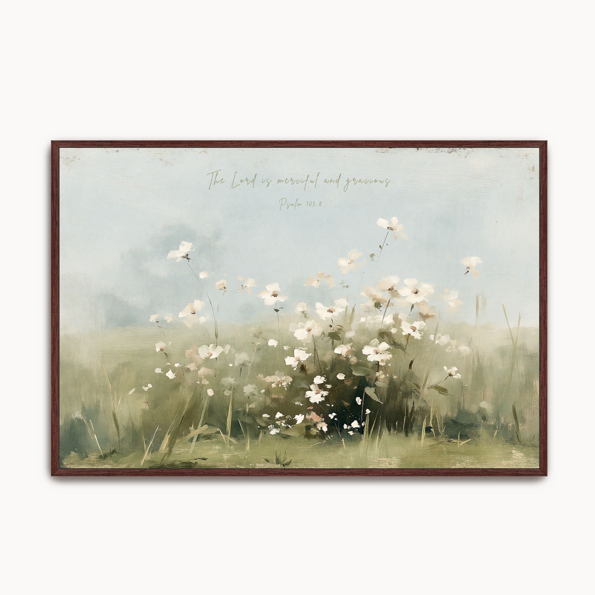 Vintage Psalm 103:8 landscape framed canvas wall art featuring soft white wildflowers in a sunlit meadow, handwritten scripture script, and an espresso wood frame.