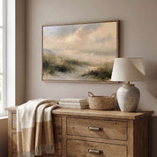 Framed vintage Psalm 27:1 Christian landscape canvas wall art featuring coastal dunes hanging above a rustic wooden dresser with a ceramic lamp in a cozy bedroom.