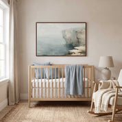 Framed vintage Psalm 18:2 Christian landscape canvas wall art featuring a coastal cliff scene hanging above a light wooden crib in a soft organic modern nursery.