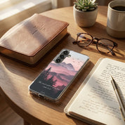 Samsung phone case with nature design on a wooden table with notebook, glasses, and coffee.
