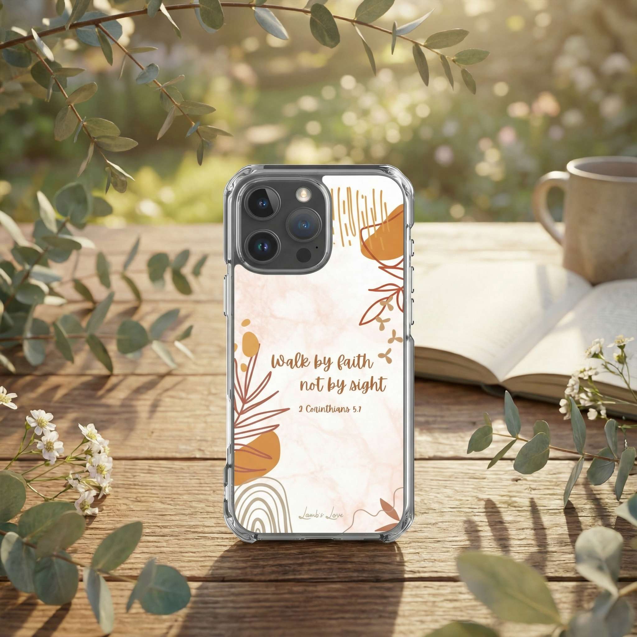 Phone case with motivational quote on a wooden surface with nature elements